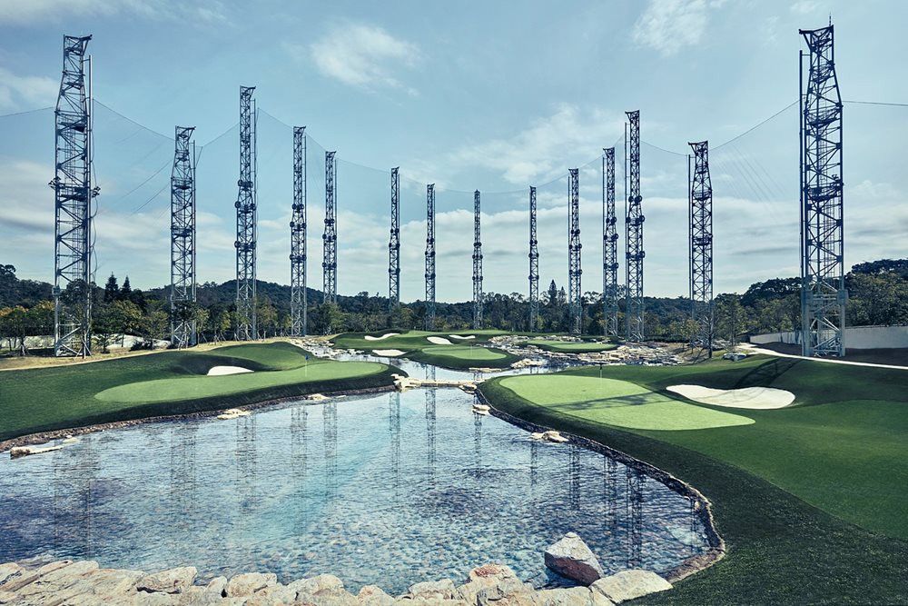 San Francisco Synthetic grass golf course with water and tall metal towers