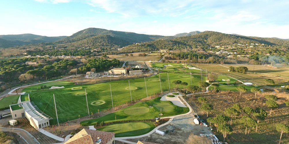 San Francisco Aerial view of a synthetic grass golf course surrounded by hills