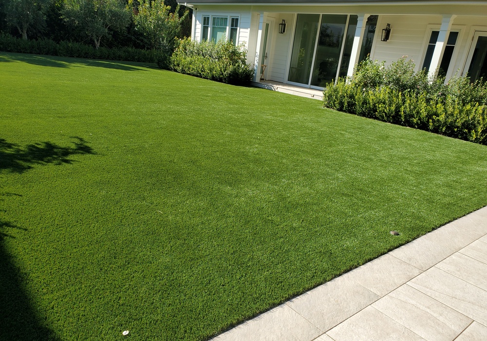 artificial grass lawn next to house